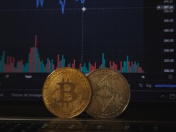 bitcoin token with laptop