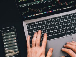 guy checking crypto exchange on laptop