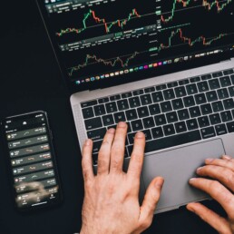 guy checking crypto exchange on laptop