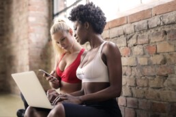 beatiful girls working on laptop