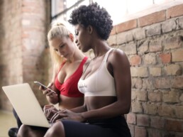 beatiful girls working on laptop