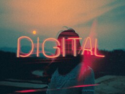digital neon light insigna in the sunset