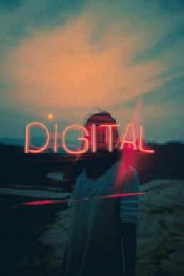 digital neon light insigna in the sunset