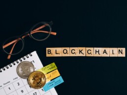 blockchain with physical coin and glasses