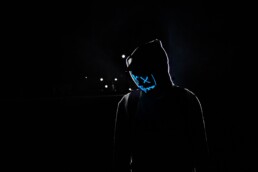 underground guy with neon mask