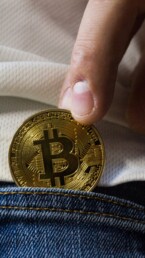 bitcoin saved in the pocket of blue jeans