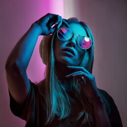 pretty girl with neon light in the face